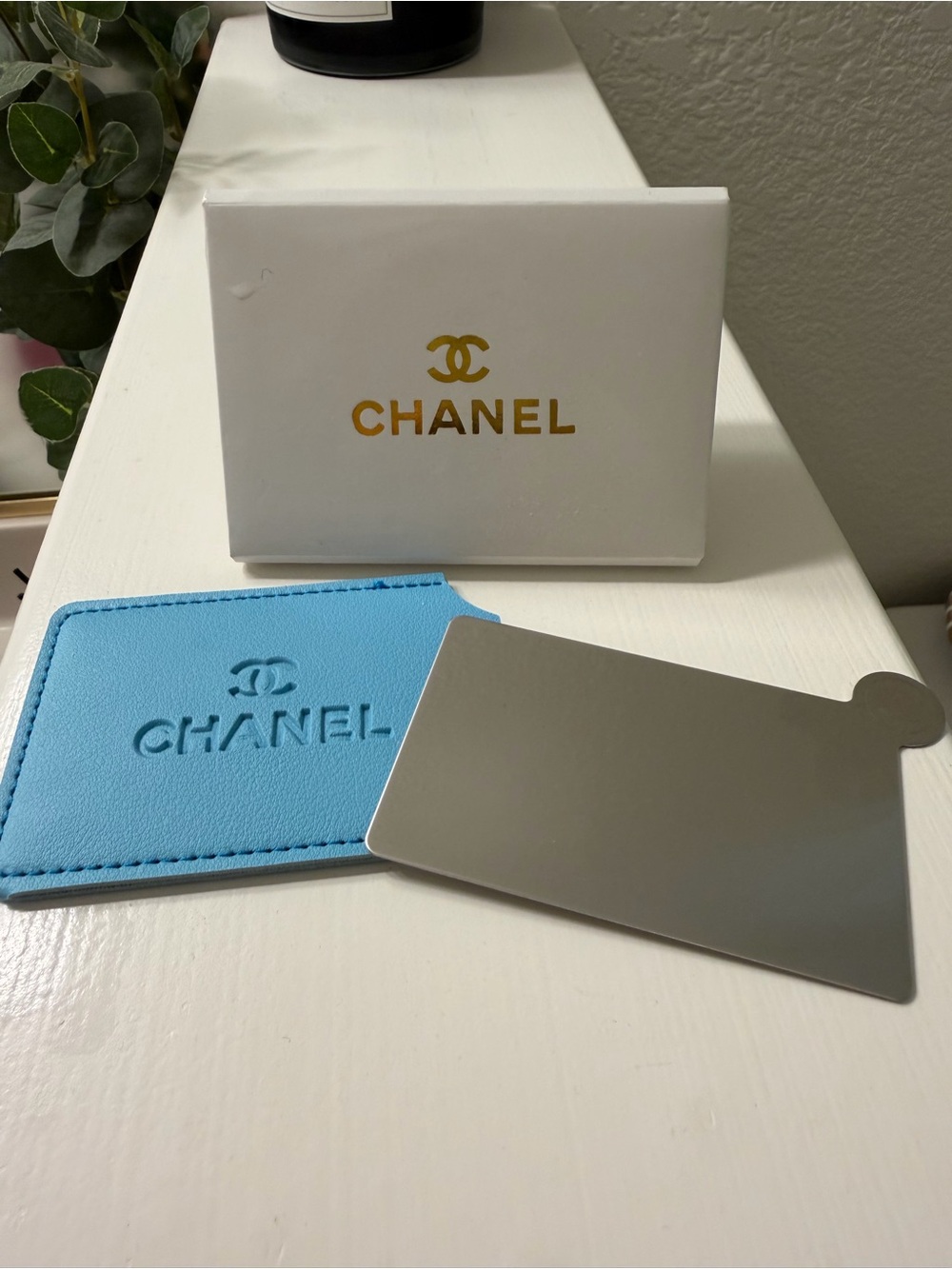 Inspired byCHANEL Blue Leatherette Card Sleeve with Silver Reflective Metal Card